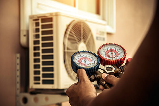 Professional Air Conditioning Service technician working in Springdale, NC